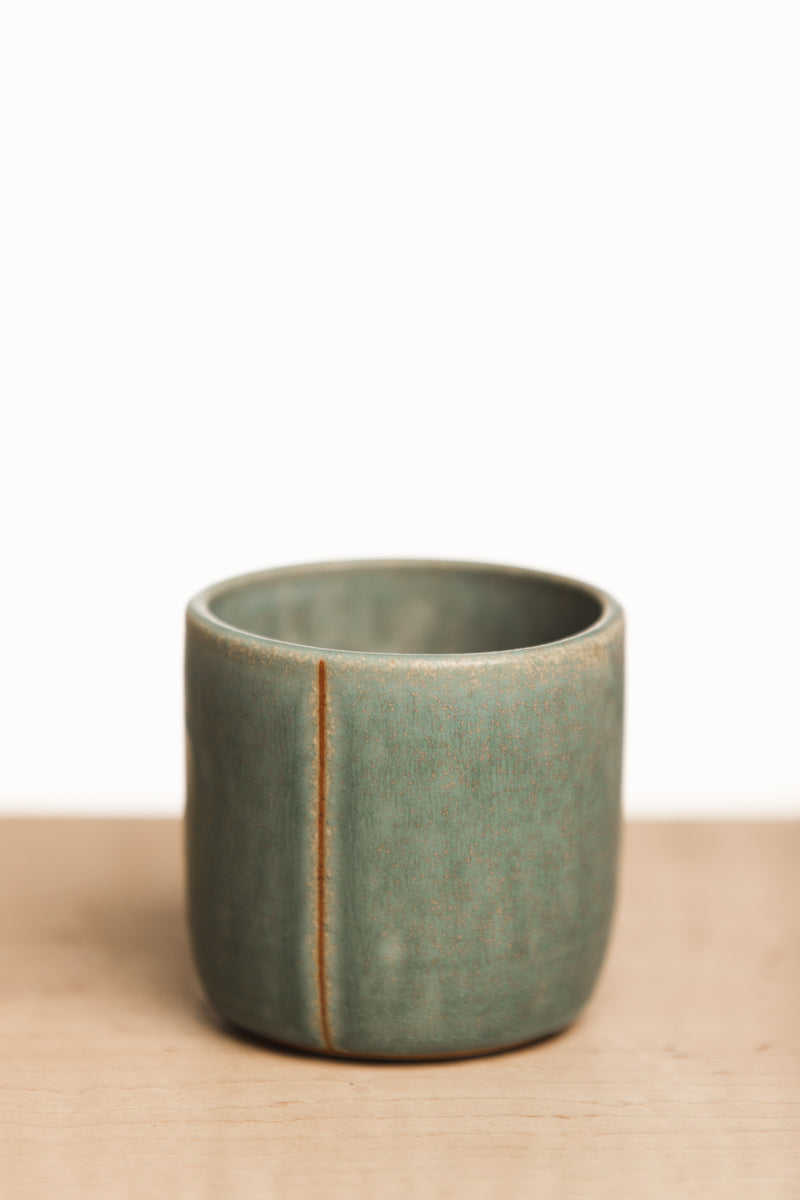 Turquoise cup with line