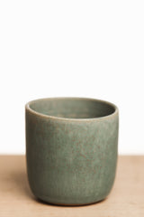Turquoise ceramic cup
