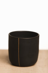 Black ceramic cup with line