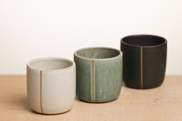 White ceramic cup with line, Turquoise ceramic cup with line, Black ceramic cup with line
