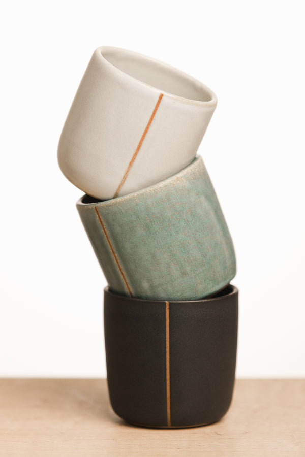 White ceramic cup with line, Turquoise ceramic cup with line, Black ceramic cup with line